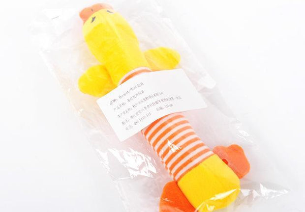 Yellow duck-shaped Funny Dog Sound Squeak Pet Toy in clear packaging, showcasing its bright colors and striped body for retail display.