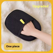 Upgraded one-piece pet hair remover glove on soft surface. Enhanced design for better grip and cleaning efficiency.