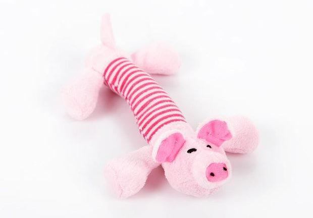 Pink pig-shaped Funny Dog Sound Squeak Pet Toy with striped body, soft plush design ideal for dogs to chew and play with.