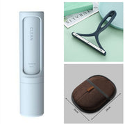 Pet grooming kit with brown glove, lint roller, and scraper. Complete solution for pet hair removal and cleaning.